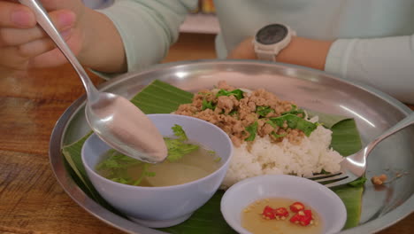 women enjoying thai lunch in a village in northern thailand, close-up shot