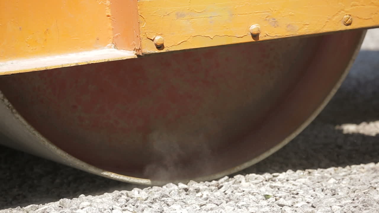 Road Roller On The Road Construction. Road roller on the road construction laying gravel