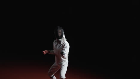 young woman fencing with a sword