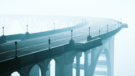 asphalt highway and mountain in deep fog