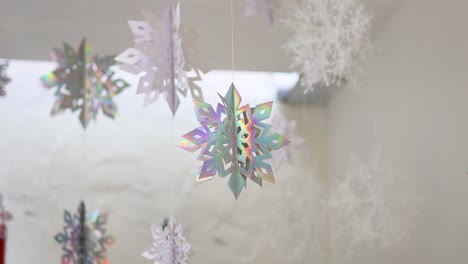 colorful snowflakes rotating in a festive setting