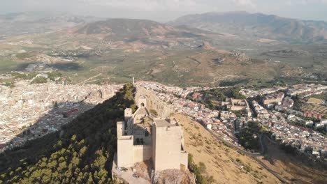 castillo de jaen, spain jaen's castle flying and ground shoots from this medieval castle on afternoon summer, it also shows jaen city made witha drone and a action cam at 4k 24fps using nd filters