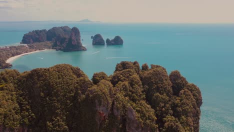 flying over rocks in krabi aonang beach