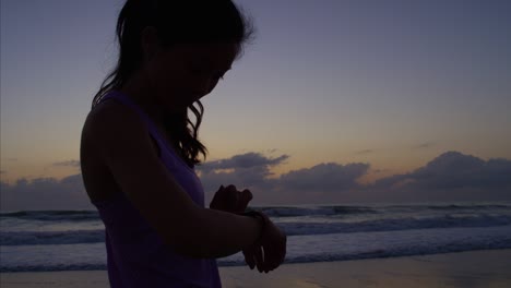 healthy asian chinese female cardio training by sea
