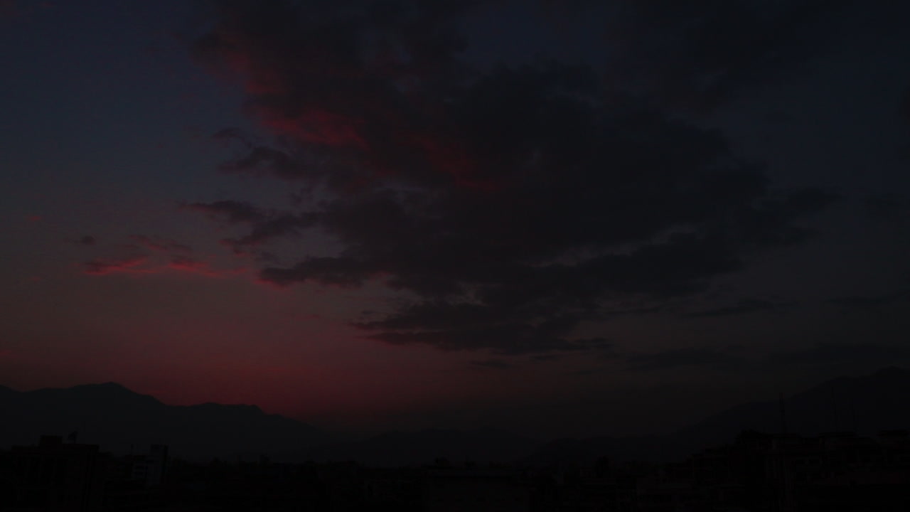Moving Time lapse of sunset over the Kathmandu valley. Video turns to complete black.