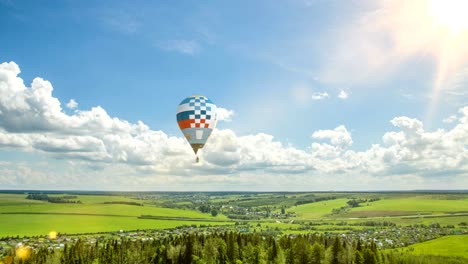 time lapse clouds in a beautiful summer landscape with a balloon, video loop