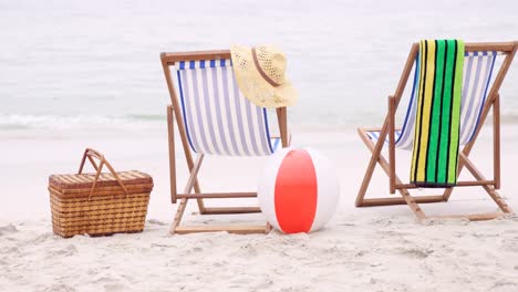 deck chairs on the sand