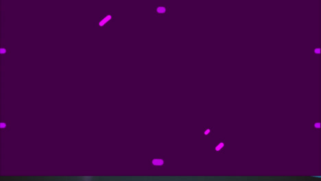 animation of pink circle spinning over purple background