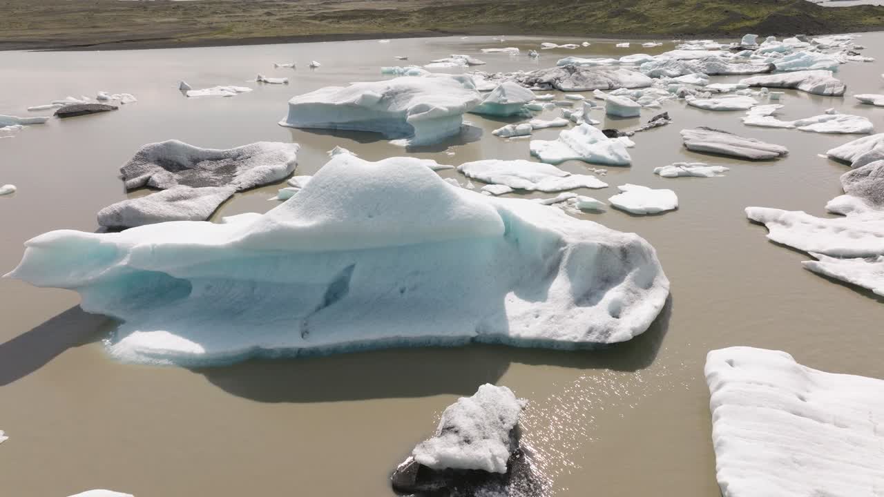Aerial View of Icebergs in a Glacial Lake
