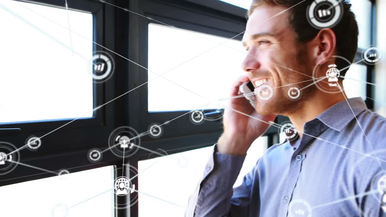 Animation of network of connections over happy caucasian businessman using smartphone