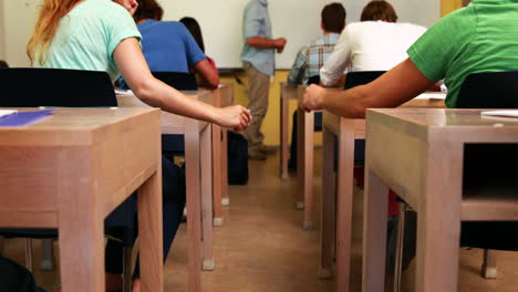 students passing notes in class