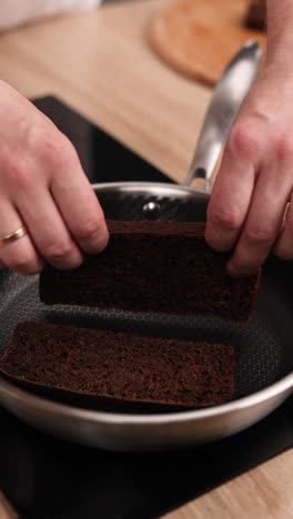 toasting rye bread in a pan