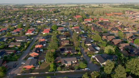 Aerial-dolly-left-showing-rural-area-in-Swedish-city-Staffanstorp