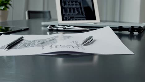 architectural drawings on a desk