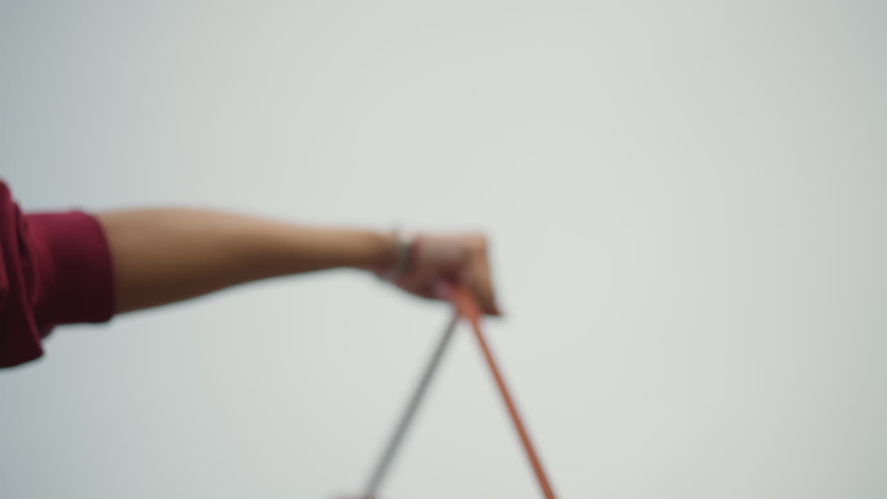 Photographs Showcasing Women Exercising With Resistance Bands In Various Styles, Series Of Images Depicting Women Performing Fitness Routines Using Resistance Bands In Gentle Colors