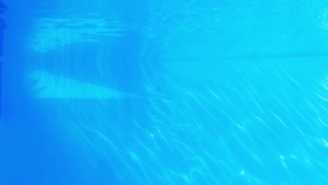 Underwater-shot-of-blue-swimming-pool