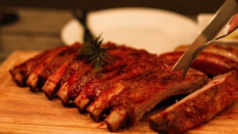 sequential cutting of juicy barbecued ribs