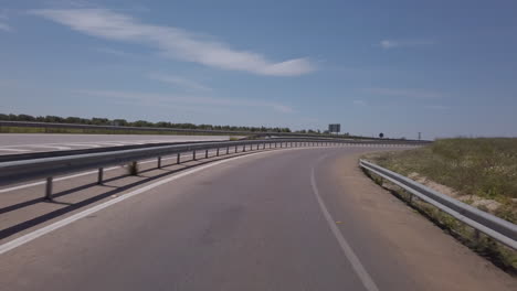 view from a car driving, direction sign towards rabat meknes fez on a highway in morocco