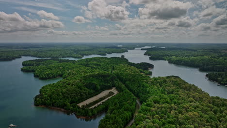 Lake-Hartwell-Georgia-Aerial-v4-landscape-of-Gumlog-and-Tugaloo-State-Park-covered-in-lush-green-forest-and-water-reservoir-bordering-Georgia-and-South-Carolina---Shot-with-Mavic-3-Cine---April-2022