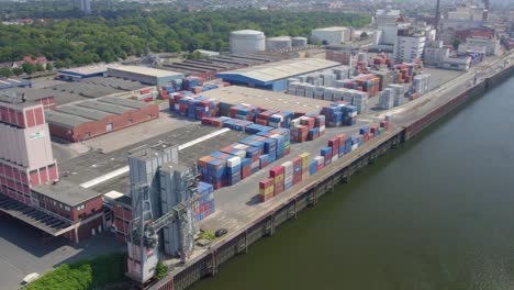 aerial view of container terminal at the port on weser river in bremen, germany