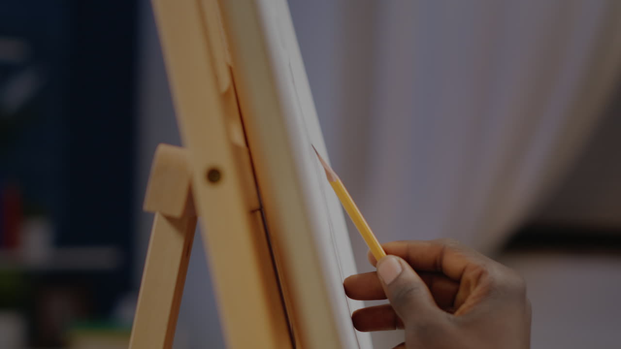 Close up of white art canvas on wooden easel