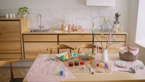 easter egg decorating in a cozy kitchen