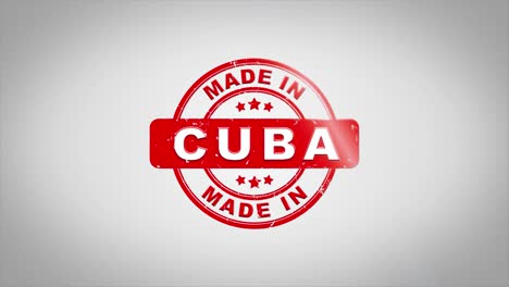 hecho en cuba firmado estampado texto estampado animación de sello de madera. tinta roja en papel blanco limpio fondo de superficie con fondo matte verde incluido.