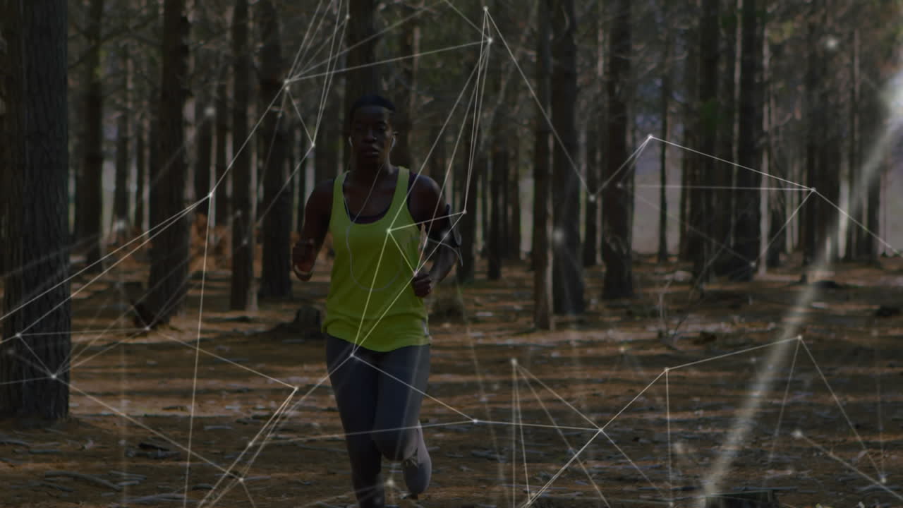 Animation of network of connections over woman running exercising in forest