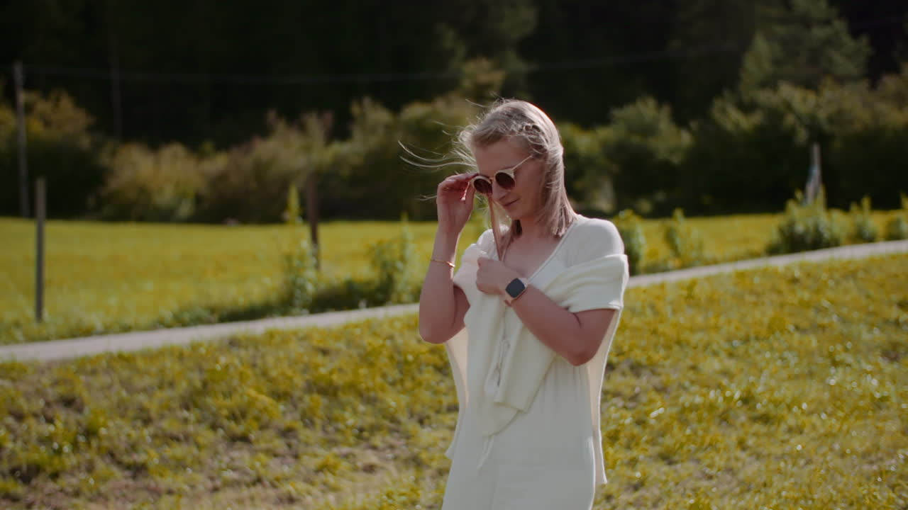 Reflective Woman Walking in Forest