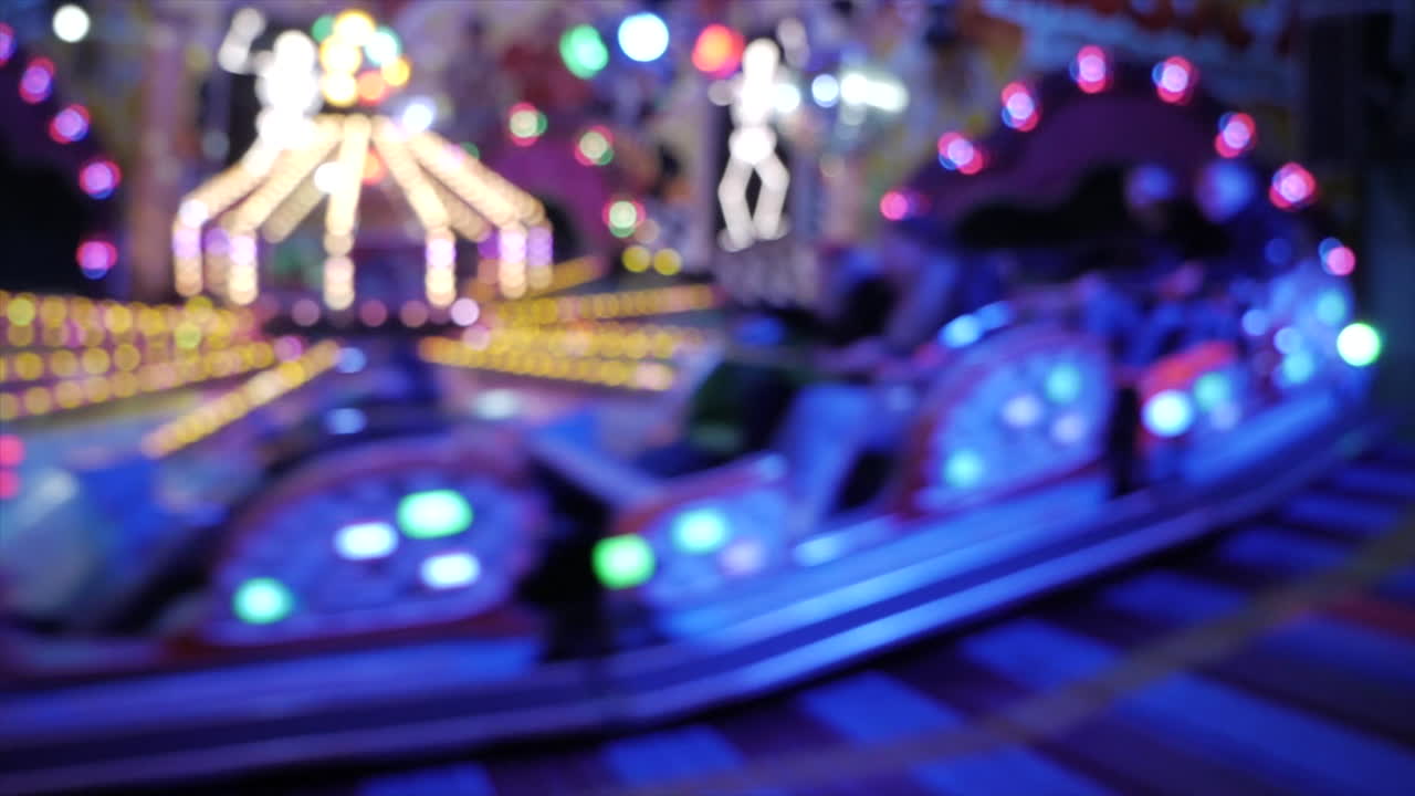 Blurred footage of riding carousel backwards with high speed,real time shot