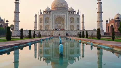 majestic taj mahal at sunrise with reflection in water