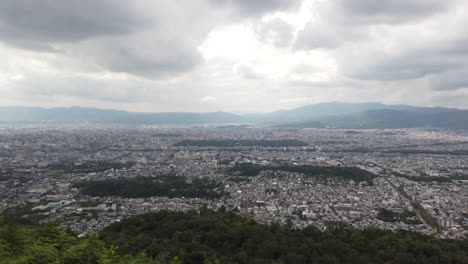 Top-Peak-Aerial-of-Kyoto-City-Japan-from-Ginkaku-Ji-Mountain-Peak-Skyline-and-Town,-Houses-and-Forest-Landscape-from-Daimonji-Mount-60-FPS