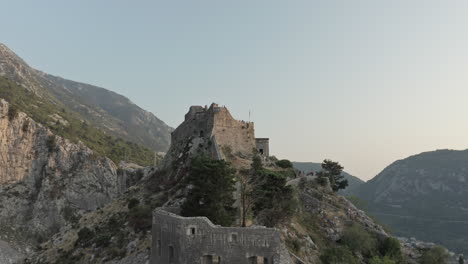 the walls of kotor are an integrated historical fortification system that protected the town incorporating military architecture with influences mainly coming from venice