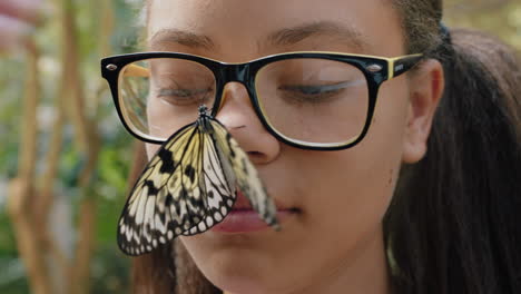 happy-girl-smiling-with-butterfly-on-face-fluttering-wings-having-fun-with-wildlife-in-nature-conservation-zoo-teenage-biology-nerd-4k