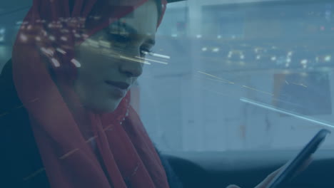woman using smartphone and cityscape