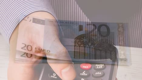 Animation-of-euro-banknotes-falling-over-hand-of-caucasian-man-holding-payment-terminal