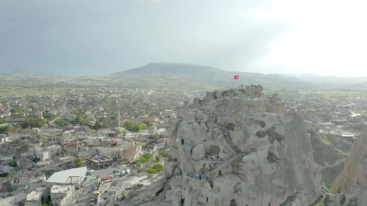aerial drone view old castle Uchisar Castle are visible at goreme village, cappadocia