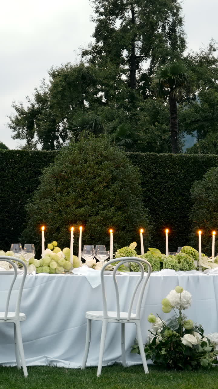 Elegant Outdoor Dining with Candles and Flowers
