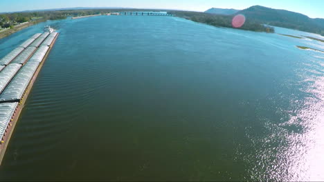 A-very-good-aerial-of-a-large-coal-barge-going-up-the-Mississippi-River-3