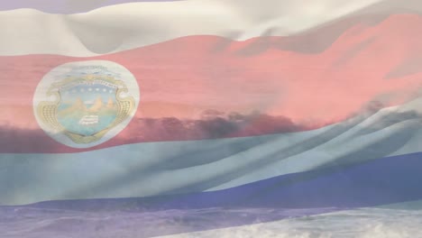 animation of flag of costa rica waving over crashing waves in sea