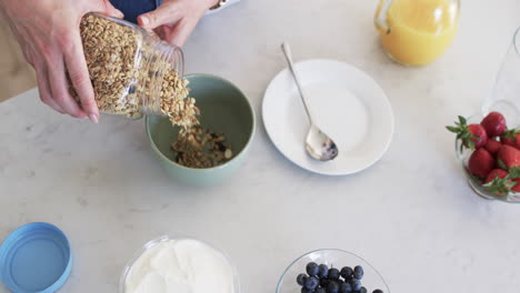 Middle-aged-Caucasian-woman-prepares-breakfast-at-home