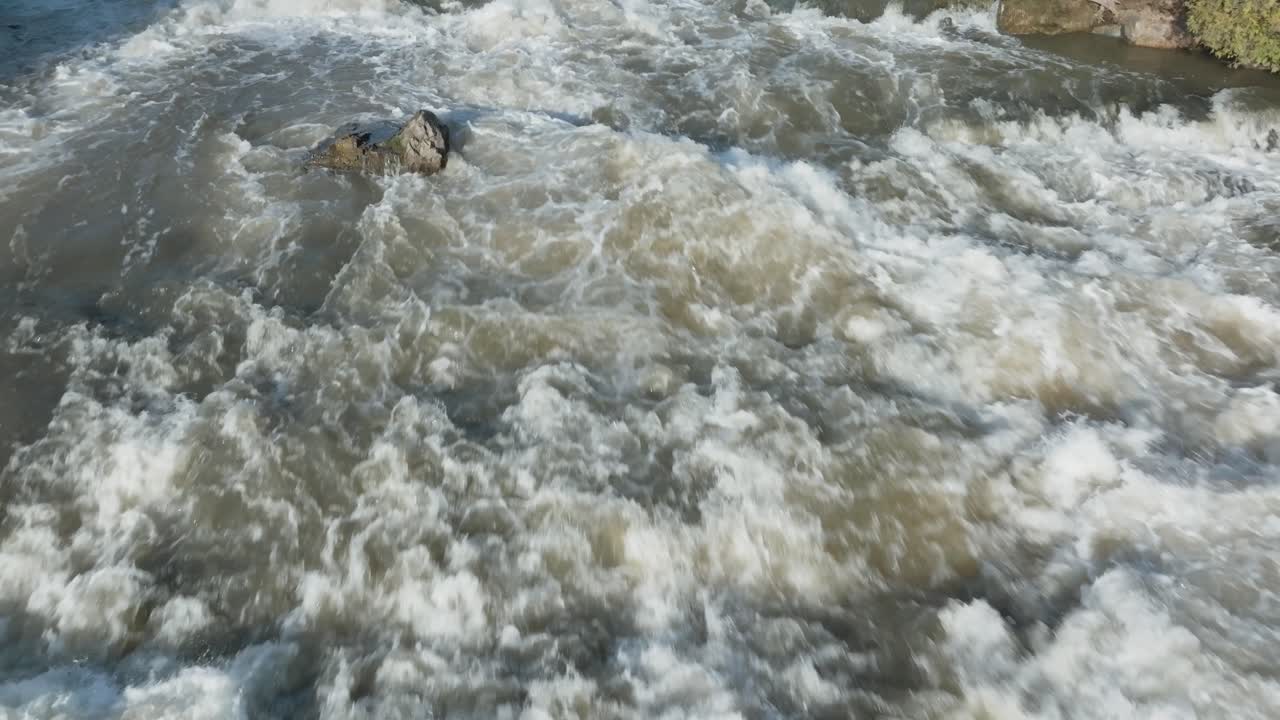 Raging waterfall in Owen Sound, Canada captured in an aerial view