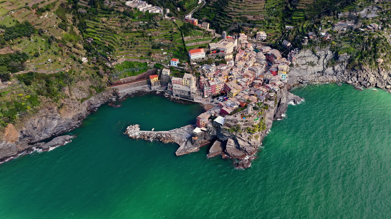 Vernazza, Cinque Terre, aerial shot of a coastal town with colorful buildings