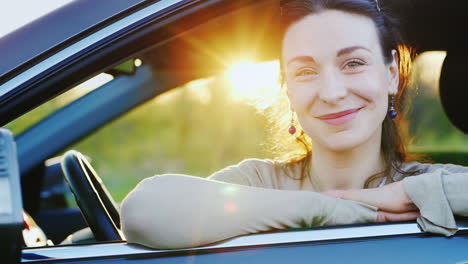 Attractive-Woman-Looks-Out-The-Car-Window-Portrait