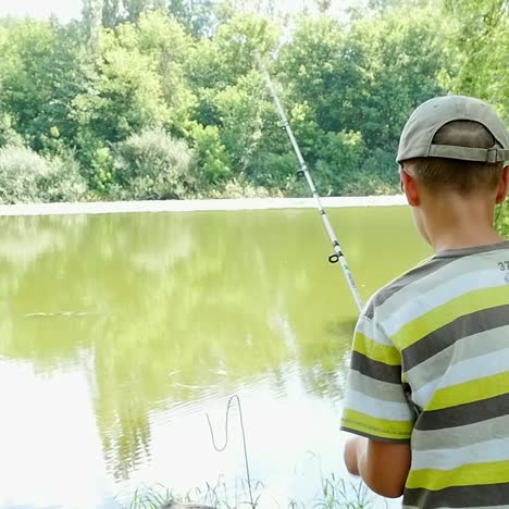 boy fishing in a lake