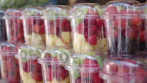 fresh fruit salad in plastic cups