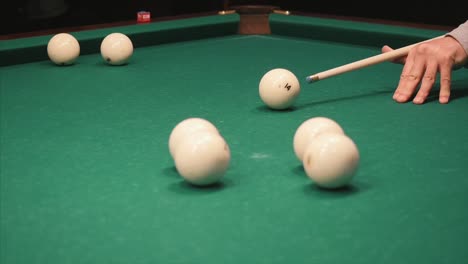 person playing russian billiards