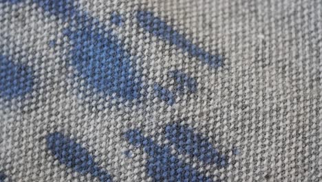 close-up of a gray and blue woven fabric