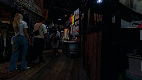 couple browsing clothes in a vintage shop