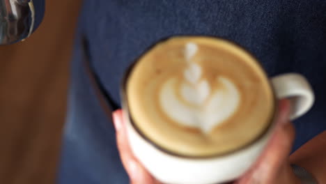 waitress doing latte art